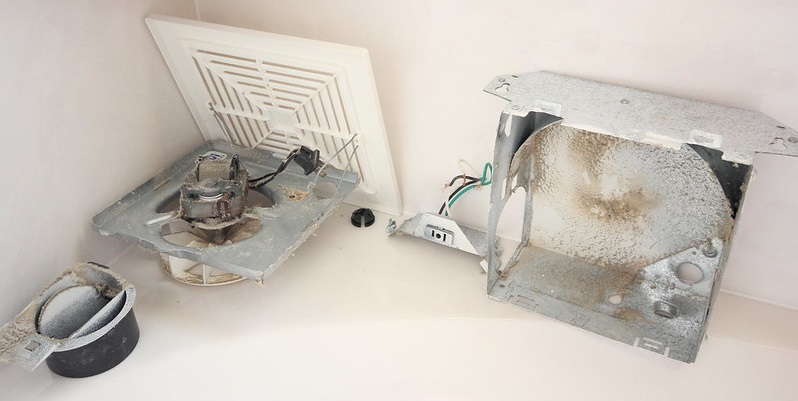 how to remove bathroom fan housing